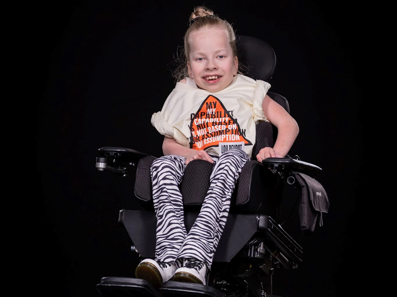 12 yr old Juli Wagner in her Permobil M-series power chair